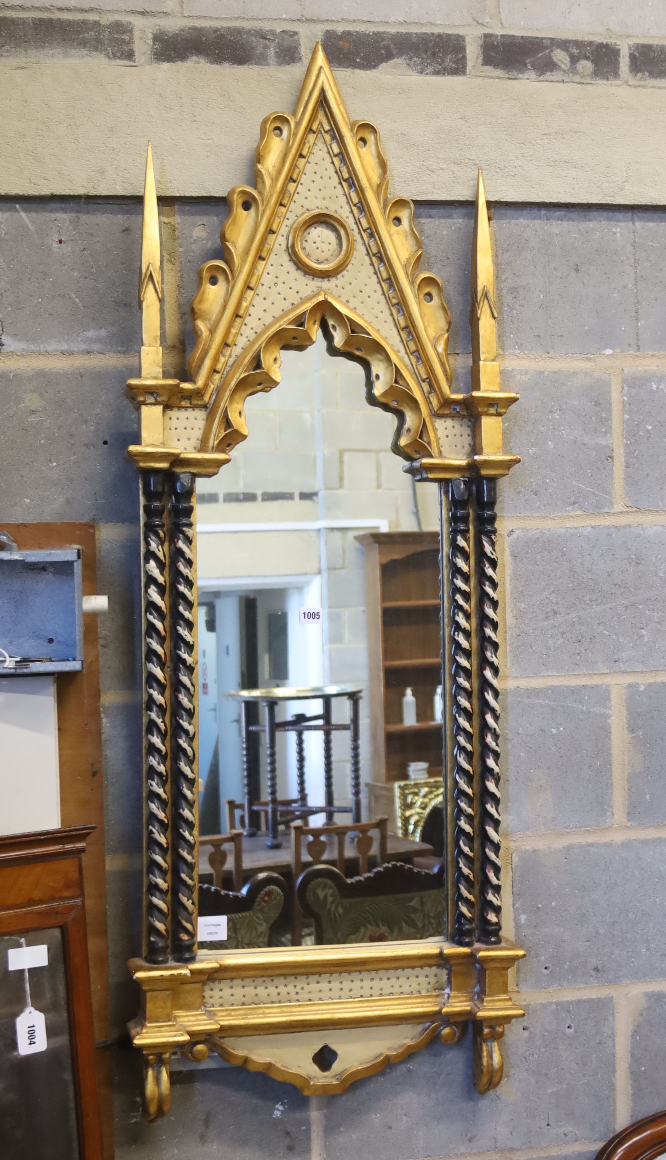 A large reproduction Gothic style gilt wood pier glass, width 54cm, height 145cm